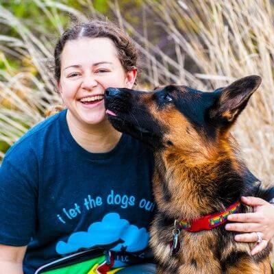 photo of dog walker with her german shepherd