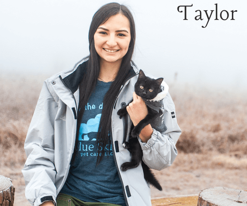 Taylor holding her black kitten