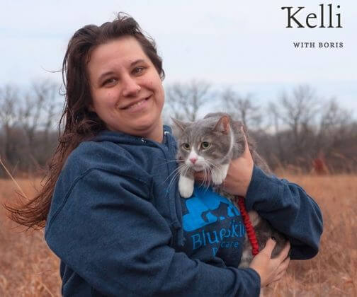 Pet Sitter, Kelli, with her grey and white cat, Boris